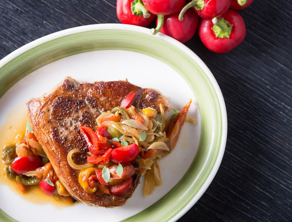 Chuleta de Puerco con Piperrada Picante (Pork Chops with Spicy Pepper Sauce) from Huertas