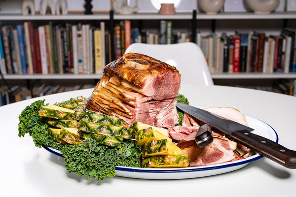 Spiral maple sugar cured ham with pineapple and kale