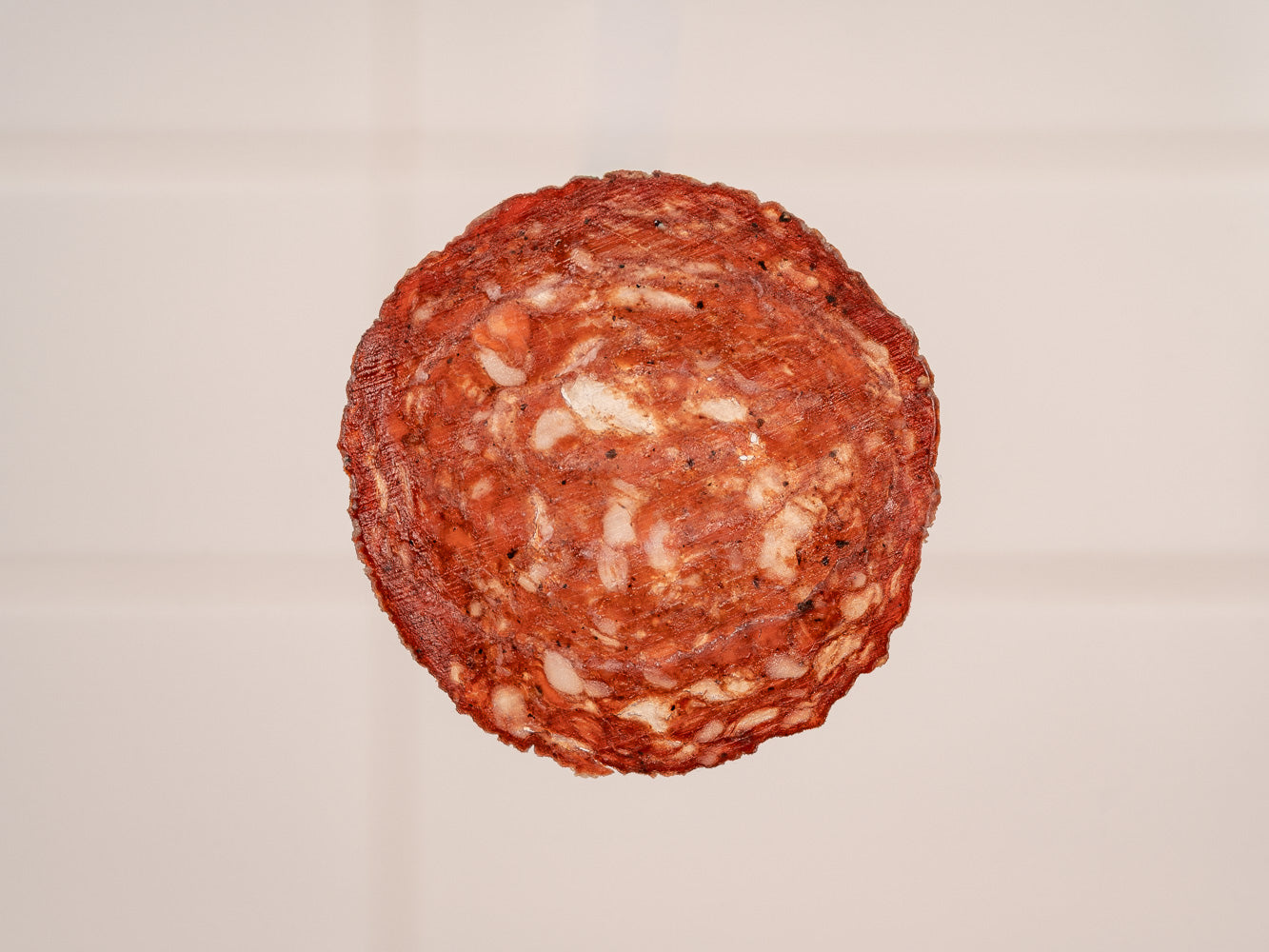 Close Up of Pre-Sliced Big Red Beef Salame | Heritage Foods
