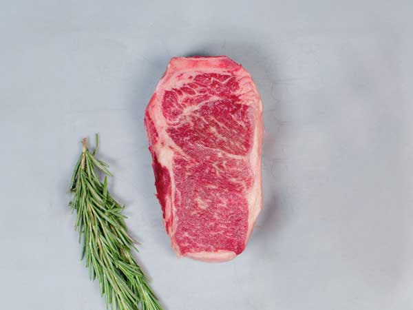 BONE-IN KC STRIP STEAK