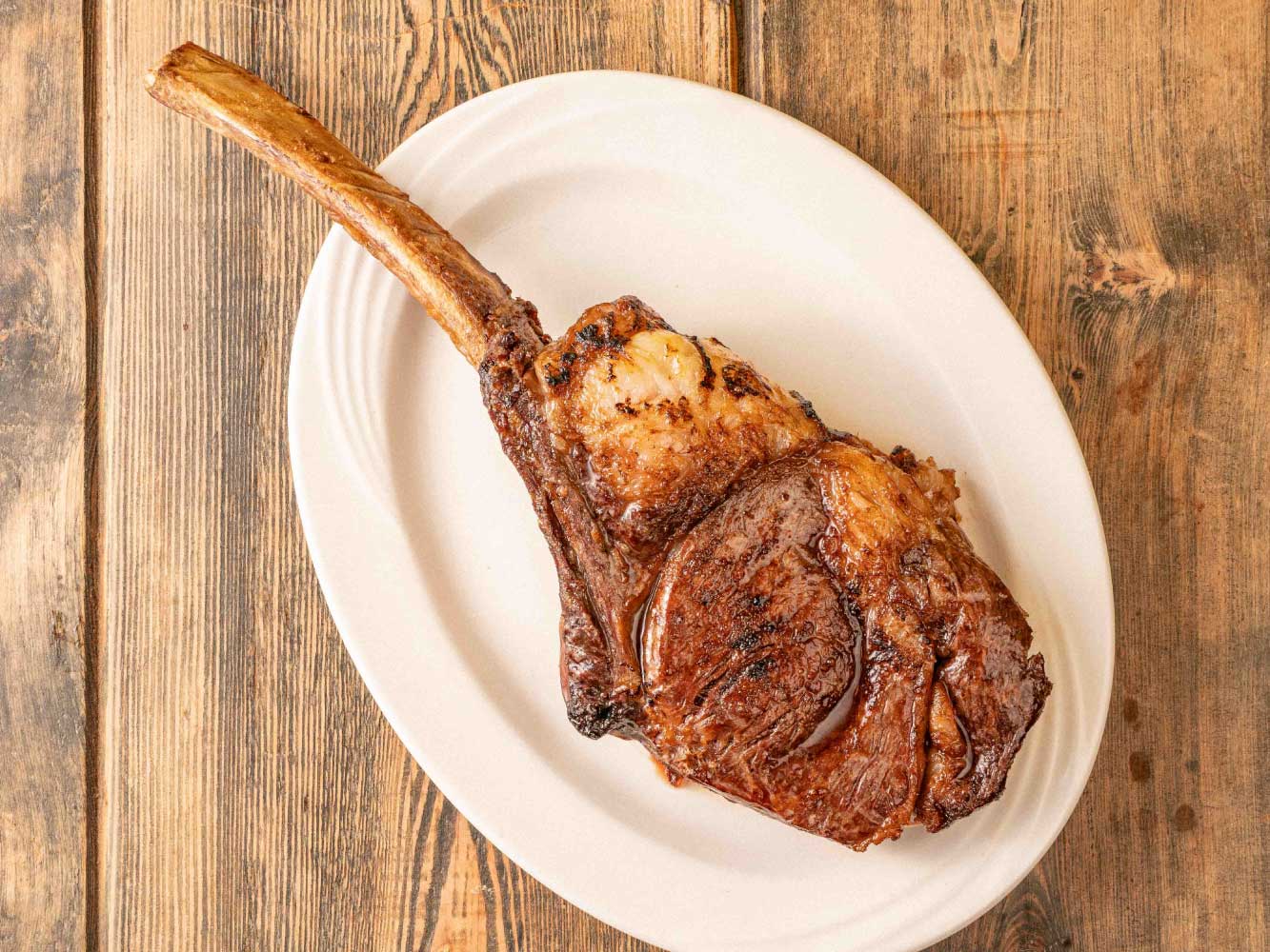 EXTRA LONG BONE RIBEYE STEAK — FOR A LIMITED TIME