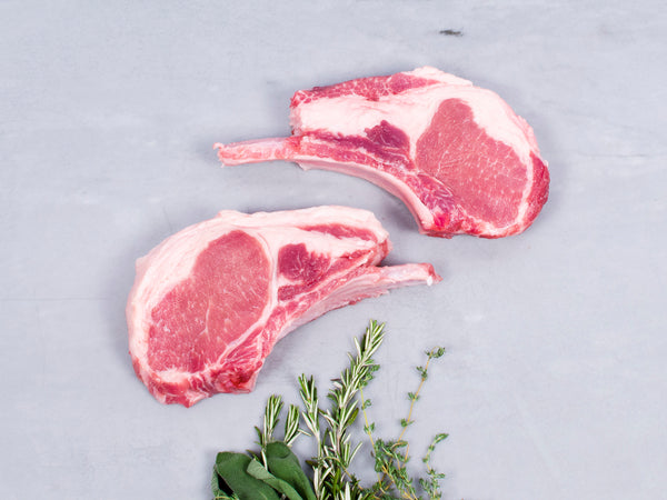 Double Cut Pork Loin Chops on a countertop